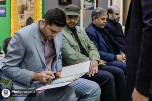 اهدای مدال قهرمانی ابوالفضل مقصودلو به موزه حرم مطهر رضوی