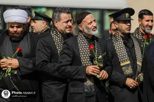 The Servants of the Holy Shrine of Imam Reza (AS) Pay Tribute at the Martyrs of Resistance Memorial in Baghdad