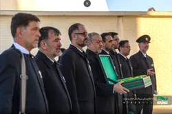 Flag, tomb cover changed at Imam Reza Shrine