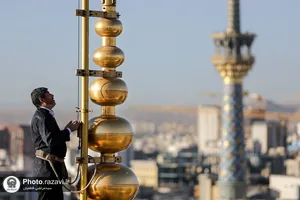 آیین تعویض پرچم حرم امام رضا علیه&zwnj;السلام همزمان با سوم ربیع الاول