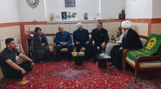 پرچم متبرک رضوی میهمان منزل شهید جنگ رمضان در آرادان شد
