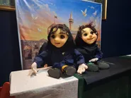 اجرای نمایش عروسکی با محوریت آموزش آداب زیارت برای کودکان در نمایشگاه «روایت امین»