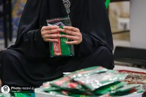 دوخت لباس مراسم شیرخوارگان حسینی در حرم مطهر رضوی