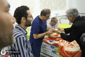 حضور خدام حرم مطهر رضوی در آسایشگاه جانبازان