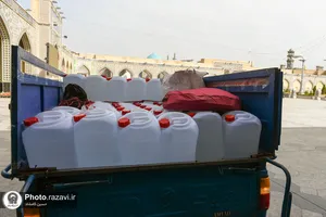 اهدای گلاب نذری از میمند فارس به حرم مطهر رضوی