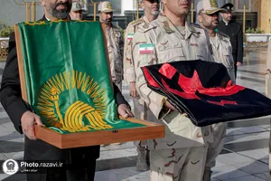 اهدا پرچم حرم مطهر امام حسین علیه السلام به آستان قدس رضوی