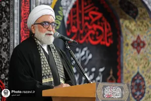 آیین تعویض پرچم گنبد منور رضوی به مناسبت آغاز ماه محرم