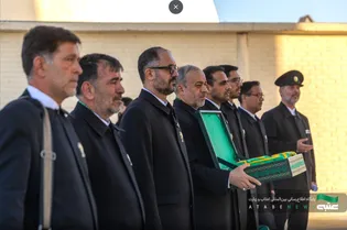 Flag, tomb cover changed at Imam Reza Shrine