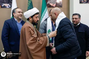 اهدای مدال قهرمانی کشتی به حرم مطهر رضوی