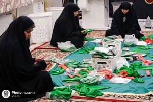دوخت لباس مراسم شیرخوارگان حسینی در حرم مطهر رضوی