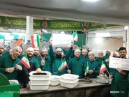 شعار استکبار ستیزی خادمان چایخانه حرم رضوی