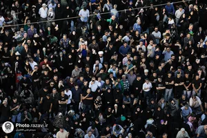 آیین تعویض پرچم گنبد منور رضوی در آستانه ماه محرم
