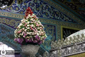 آیین تعویض پرچم حرم امام رضا علیه&zwnj;السلام در آستانه ماه ربیع الاول