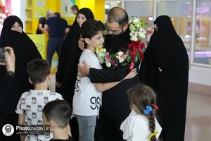 استقبال از علیرضا بیژنی، قاری و موذن بارگاه منور رضوی در بازگشت از مسابقات بین&zwnj;المللی قرآن کریم مالزی