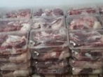 توزیع بسته های گوشت قربانی بین خانواده های کم برخوردار بناب