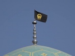 اهتزاز پرچم عزا بر فراز گنبد آستان حسین بن موسی الکاظم طبس