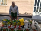 توزیع بسته‌های مواد غذایی بین نیازمندان اسفراین