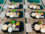 بسته‌ ارزاق دانش آموزان مدرسه امام رضا(ع) به‌دست زنان سرپرست خانوار رسید