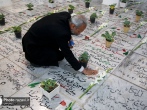 مزار شهدای مدفون در بهشت ثامن‌الائمه(ع) صحن جمهوری اسلامی غبارروبی و عطرافشانی شد