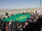 اهتزاز پرچم متبرک حضرت علی بن موسی الرضا (ع) در بام ایران 