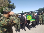 نیروهای یگان ویژه کرج در برابر پرچم سبز رضوی ادای احترام کردند