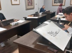  کتابت حدیث «سلسله الذهب» توسط خوشنویسان مکتب هنر رضوان مشهد