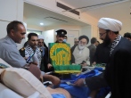 عیادت خادمین حرم امام رضا (ع) از مجروحین حادثه بندر شهید رجایی / گزارش تصویری