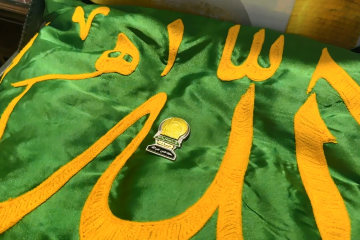 اهدای حکم و نشان خادمی شهید سید حسن نصرالله به خانواده شهید 